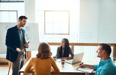 Buy stock photo Business people, team and presentation for discussion, meeting or brainstorming ideas. Presenter, sales and manager training group with data, information or project stats on chart at startup office