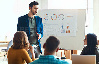 Buy stock photo Board, presentation and businessman with team in meeting at office with demographic statistics. Collaboration, project and speaker with people for population charts at training workshop in workplace.