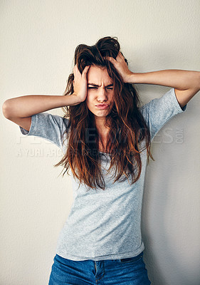 Buy stock photo Mental health, anxiety and woman in studio with hair pulling, anger and identity crisis for sad gen z student. Burnout, stress and frustrated girl with depression, hands on head and white background