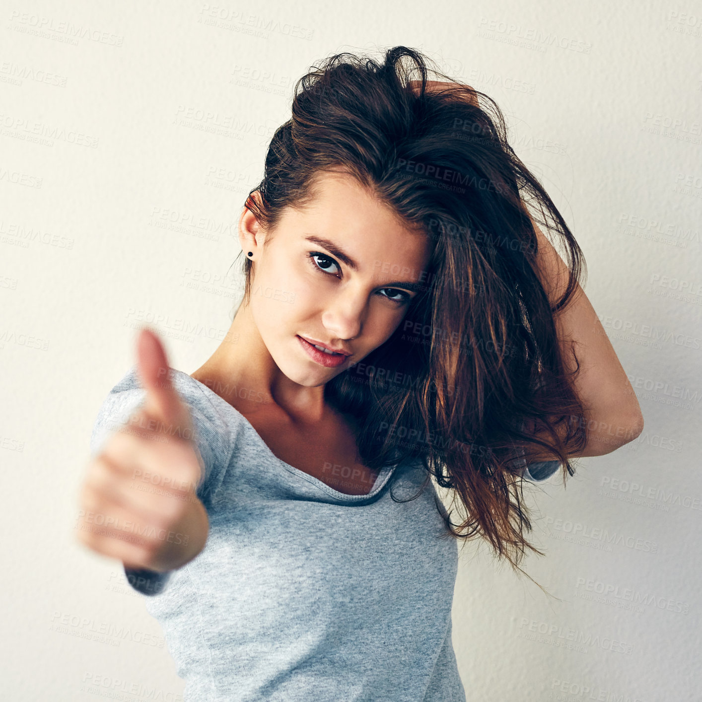 Buy stock photo Woman, confident and thumbs up for haircare in white background with treatment for hygiene, clean and fresh. Female person, portrait and yes or agree for routine, results and natural for care