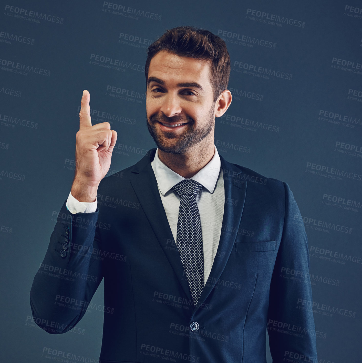 Buy stock photo Business man, portrait and pointing for profit growth, news and advertisement with smile in studio. Happy, confidence and corporate finance employee with promotion, deal and offer on blue background 