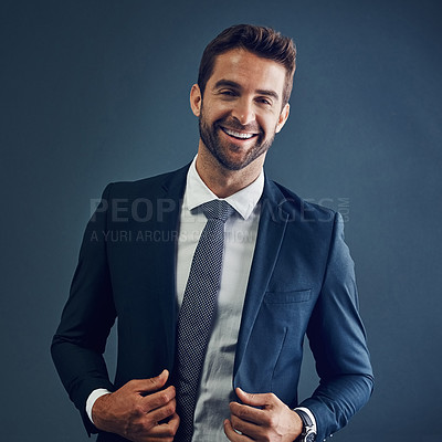 Buy stock photo Studio, laughing or businessman in portrait with pride, professional career and confidence with formal suit. Male person, immigration lawyer and smile by blue background for advice, justice and case