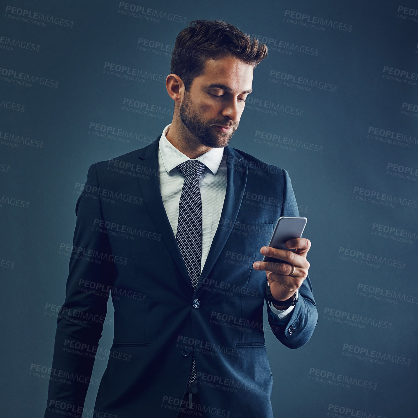 Buy stock photo Businessman, reading and online with smartphone on studio background for corporate communication, digital connection and research. Manager, email and internet for business app, networking and website