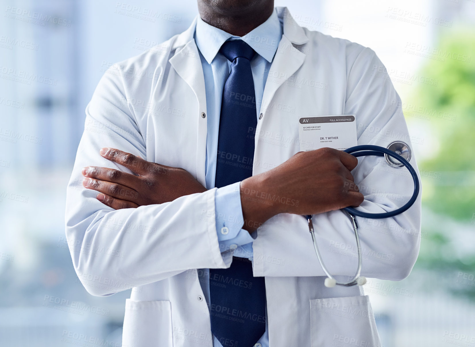 Buy stock photo Man, arms crossed and doctor for healthcare in clinic, stethoscope and physician to listen to heart. Male person, surgery and cardiology specialist for consulting, medical tool and heartbeat monitor