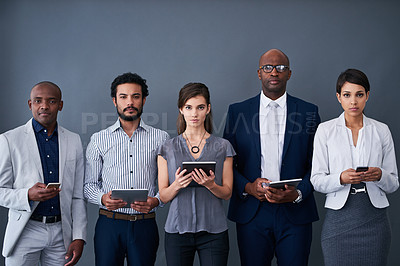 Buy stock photo Business, employee and row with technology in studio with grey background for communication. Portrait, waiting room and people for recruitment for job interview, career opportunity and diversity