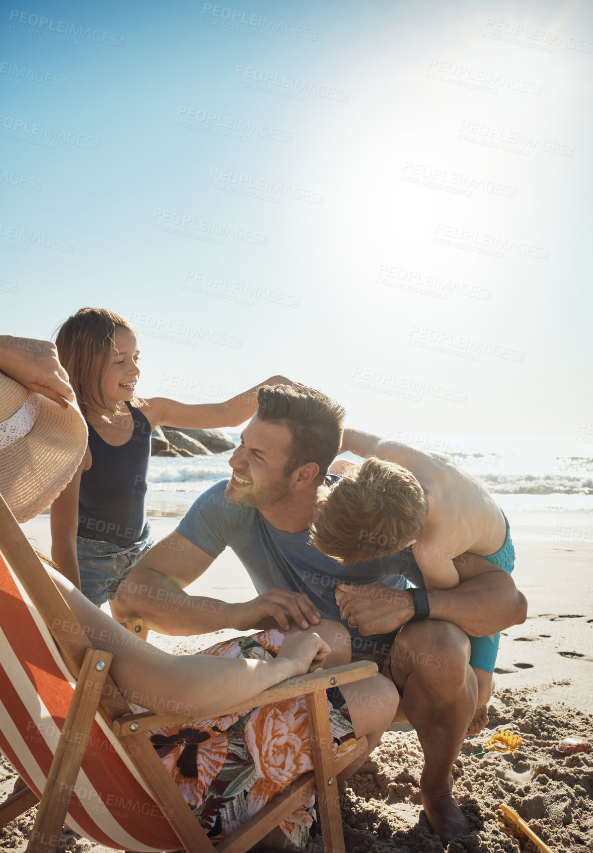 Buy stock photo Family, beach and parents with kids, fun and bonding together with vacation, active and ocean. Seaside, mother and father with children, travel and adventure with holiday, getaway trip and relax