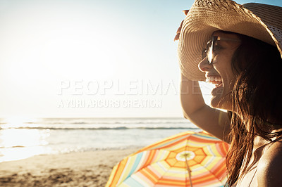 Buy stock photo Cropped shot of a beautiful young woman at the beach