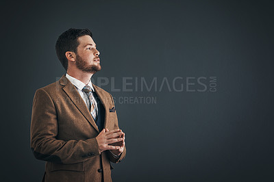 Buy stock photo Thinking, serious and man in studio, professional and ideas for education, teacher and confident for college. Mockup space, business person and assistant professor in university and black background