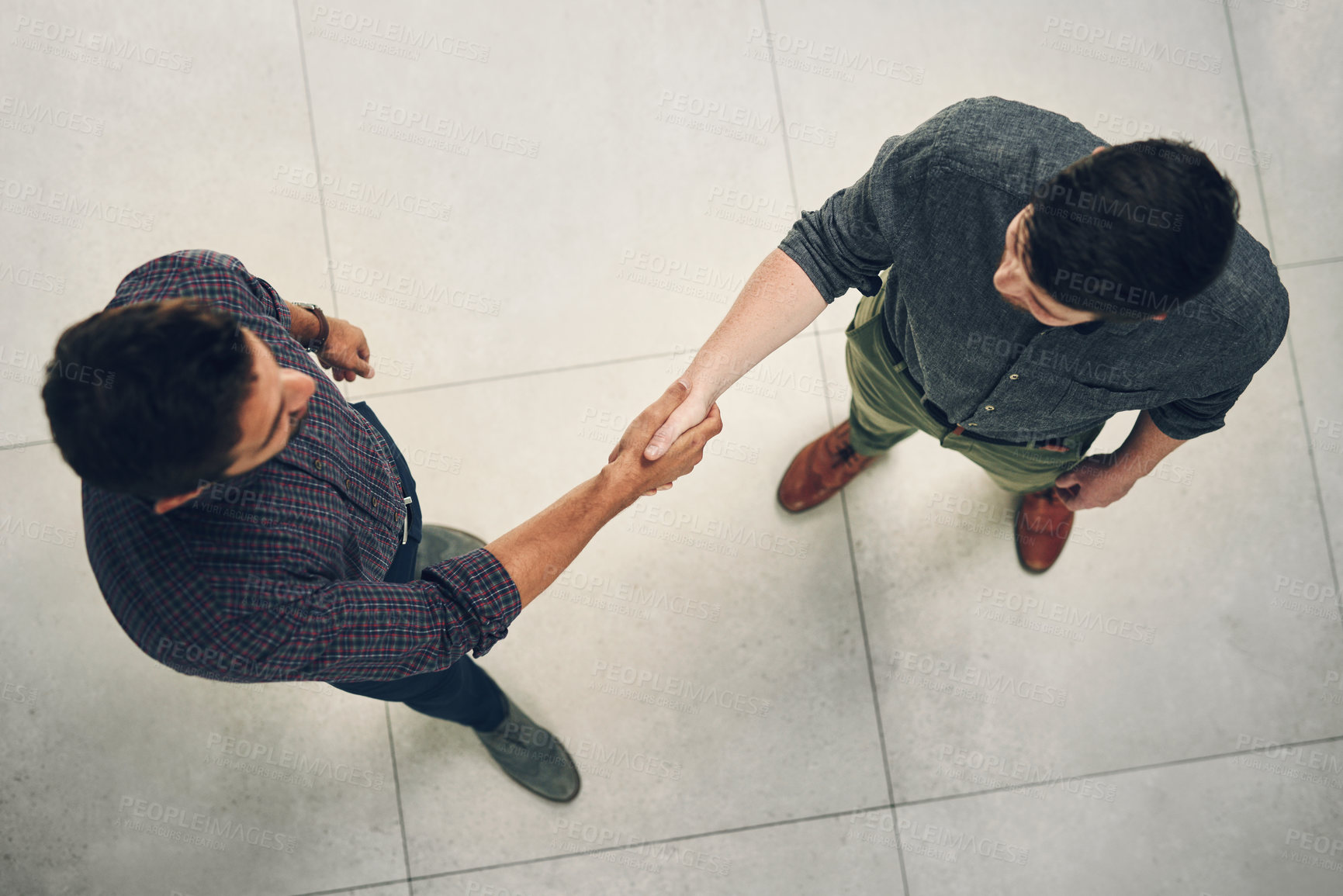 Buy stock photo Business meeting, handshake and top view of people in office with recruitment offer, agreement and hiring success. Interview, thank you and men shaking hands in support, promotion or well done praise