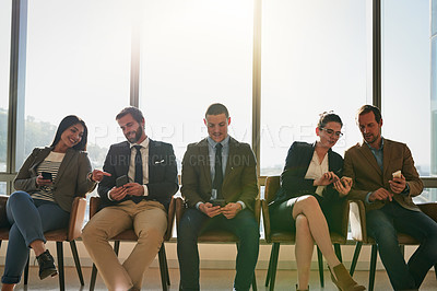 Buy stock photo Hiring, wait and row of people with vacancy, discussion and digital notes on smartphone. Recruitment, diversity and candidate group ready with plan, work opportunity and queue for paperless interview