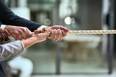 Buy stock photo Hands, teamwork and rope with business people pulling during a game of tug of war in the office. Collaboration, help and strength with a team of employees or colleagues holding onto an opportunity