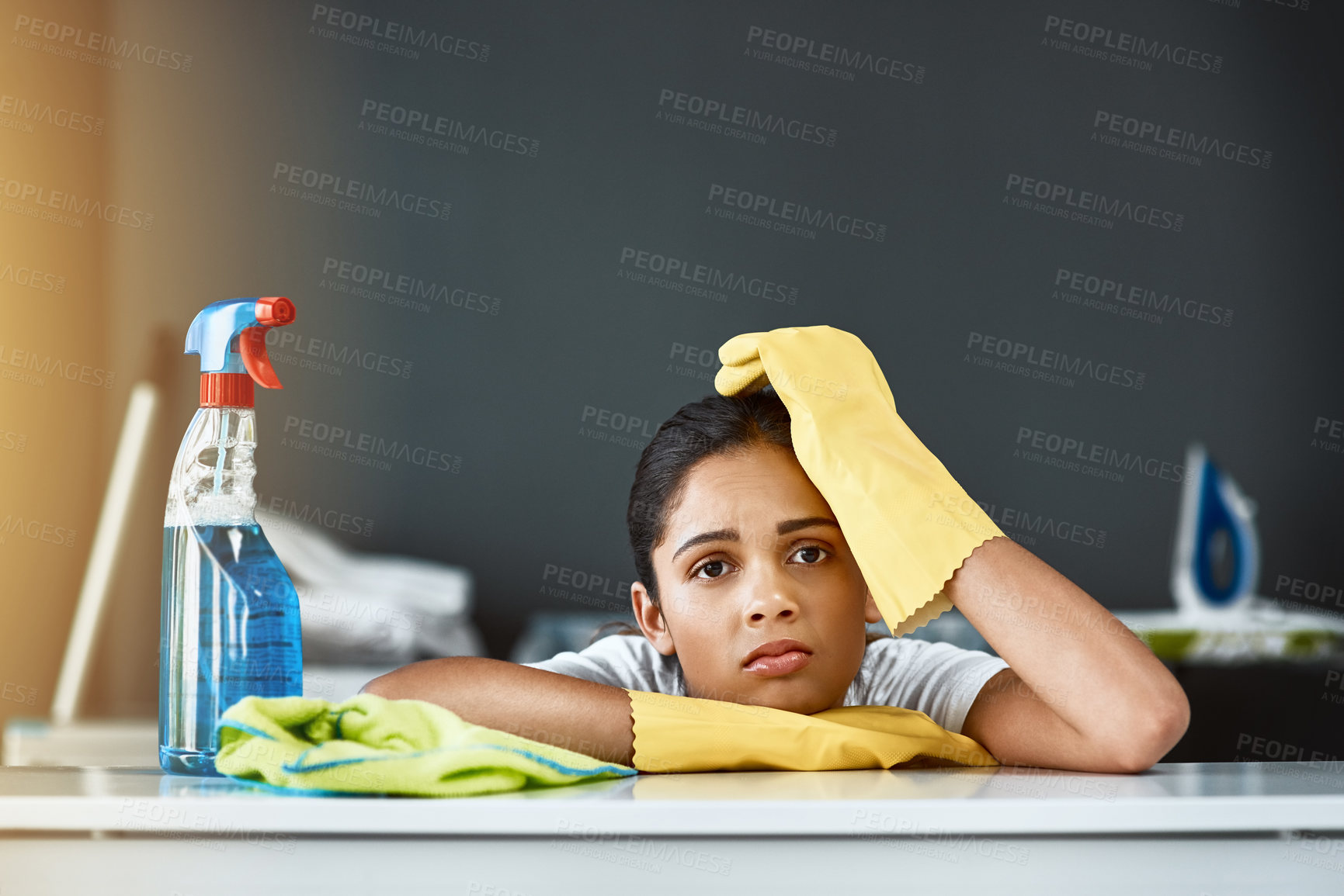 Buy stock photo Portrait, woman and bored of cleaning in home with weekend chores, maintenance and cloth. Maid girl, hygiene and fatigue for housekeeping service with work break, burnout and tired in apartment