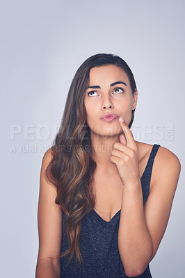 Buy stock photo Thinking, idea and woman in studio with style for choice, option and decision on white background. Facial expression, wondering and isolated person with unsure, doubt and question in trendy clothes