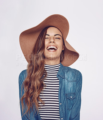 Buy stock photo Fashion, laughing and portrait of woman in studio with stylish, trendy and casual outfit for confidence. Happy, pride and female person from Canada with hat and chic clothes by white background.