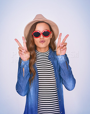 Buy stock photo Woman, fashion and sunglasses with peace sign in studio of retro clothes, vintage aesthetic and trendy accessories. Girl, pout and lips glasses with v icon for funky outfit style on purple background