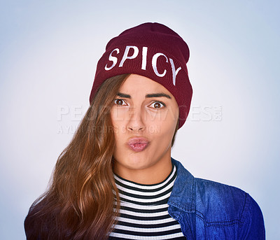 Buy stock photo Portrait, woman and confused for fashion in studio with spicy beanie, fierce attitude and decision of style. Girl, doubt and retro clothes of uncertain choice, vintage aesthetic and purple background