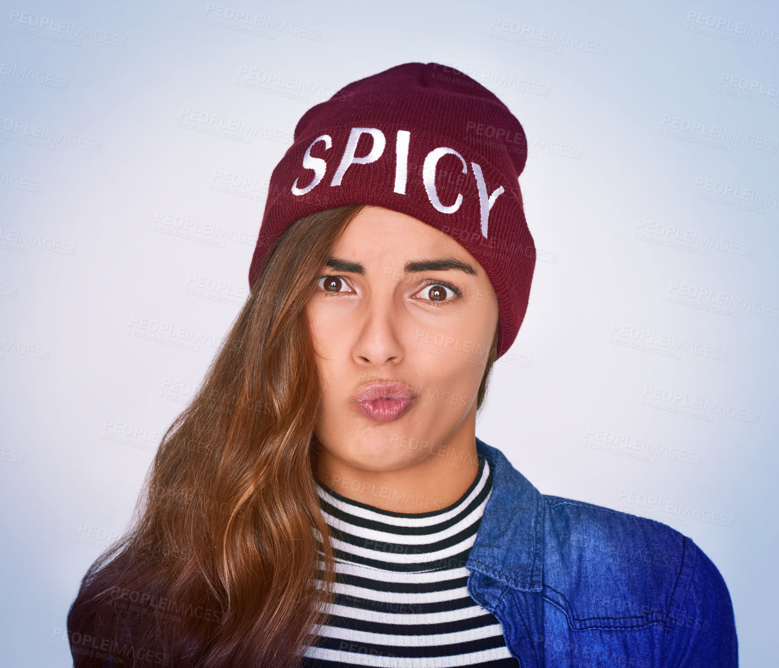 Buy stock photo Portrait, woman and confused for fashion in studio with spicy beanie, fierce attitude and decision of style. Girl, doubt and retro clothes of uncertain choice, vintage aesthetic and purple background