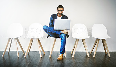 Buy stock photo Waiting room, business man and laptop for interview, planning and research questions for hr recruitment. Wall background, male candidate and digital for information, opportunity and reading portfolio