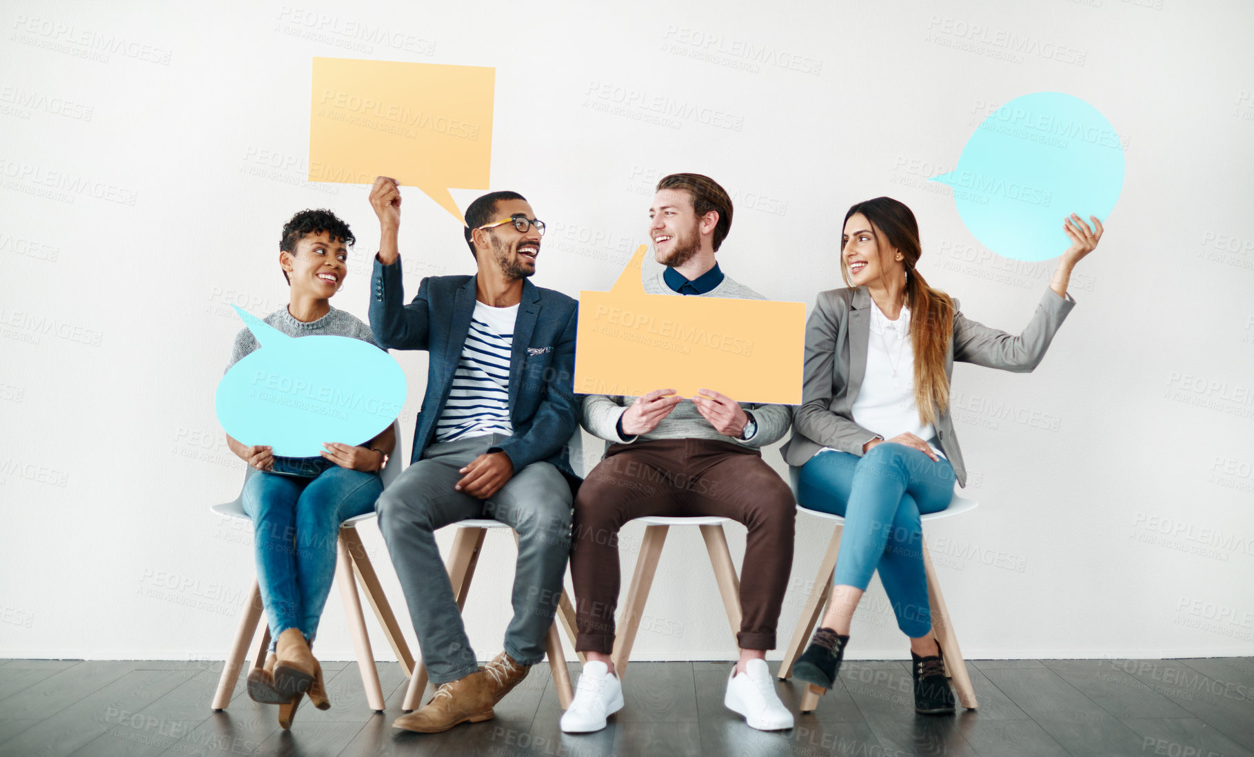 Buy stock photo Happy, business people and waiting room with speech bubble for social media or review on a white studio background. Young, group or employees with smile, sign or shape for comment, feedback or mockup