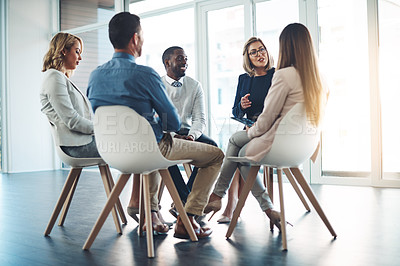 Buy stock photo Full length shot of a group of corporate colleagues meeting in their office