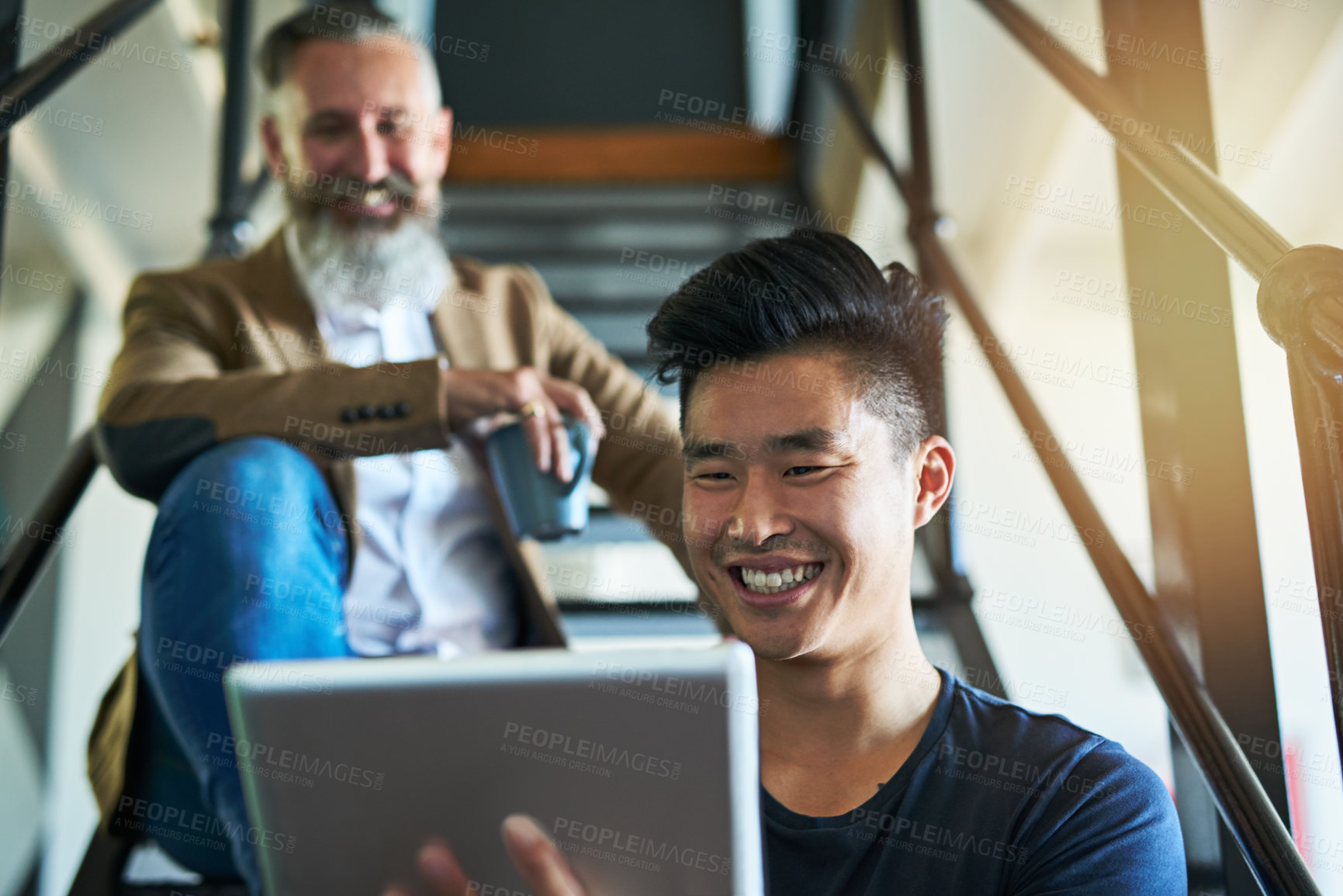 Buy stock photo Meeting, stairs and business people on tablet in office for online report, website and research. Startup company, creative and man with manager on digital tech for discussion, teamwork and planning