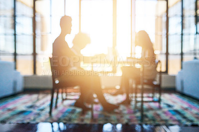 Buy stock photo Silhouette, people in business meeting and lens flare or sunlight in modern office planning. Teamwork or collaboration, support and colleagues talking or discussing together at desk in workplace 