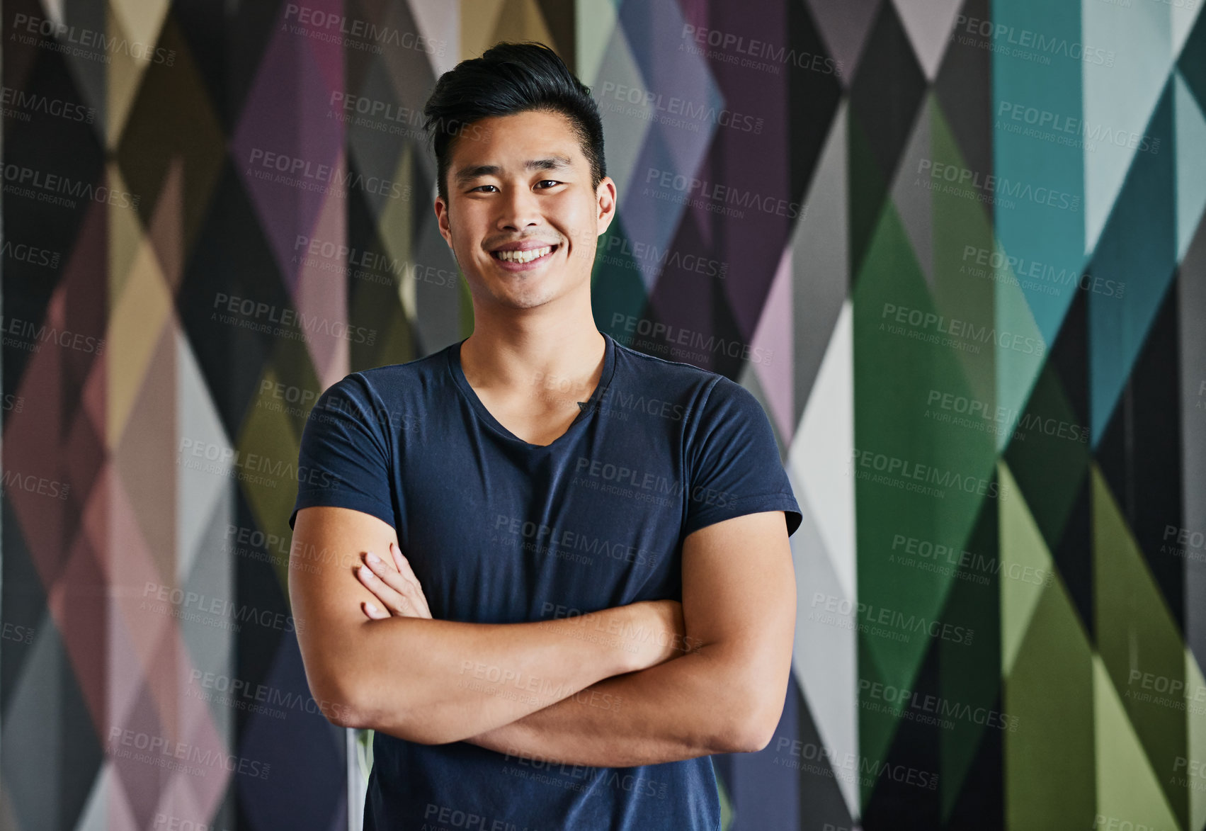 Buy stock photo Happy, Asian man and arms crossed on pattern background for creative ideas or textile technician in Japan. Male person, employee and confident on portrait with career growth, opportunity and designer