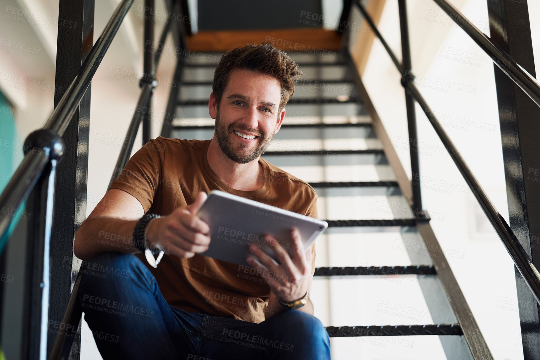 Buy stock photo Man, office and portrait with tablet in staircase for creative idea, research and project as interior designer. Business, male employee and smile in startup on for communication and networking