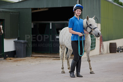 Buy stock photo Shot of a young girl and her horse outdoors