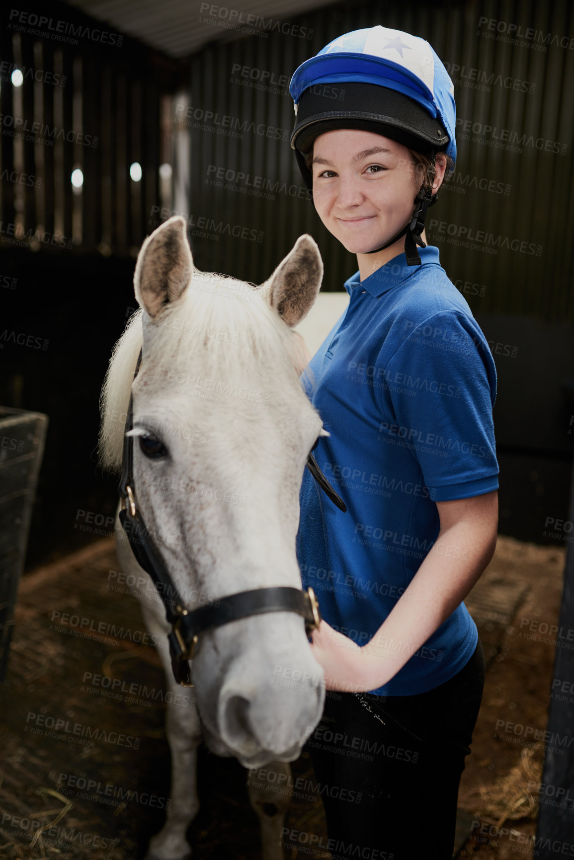 Buy stock photo Girl, horse and portrait in barn for equestrian, development and learning with bonding or connection. Teenager, animal and pet in stable for riding, care and fitness with smile, exercise and helmet
