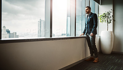 Buy stock photo Office, thinking and businessman at window in city with ideas, insight or decision for property developer. Realtor, entrepreneur or man with business plan, inspiration or vision in urban real estate