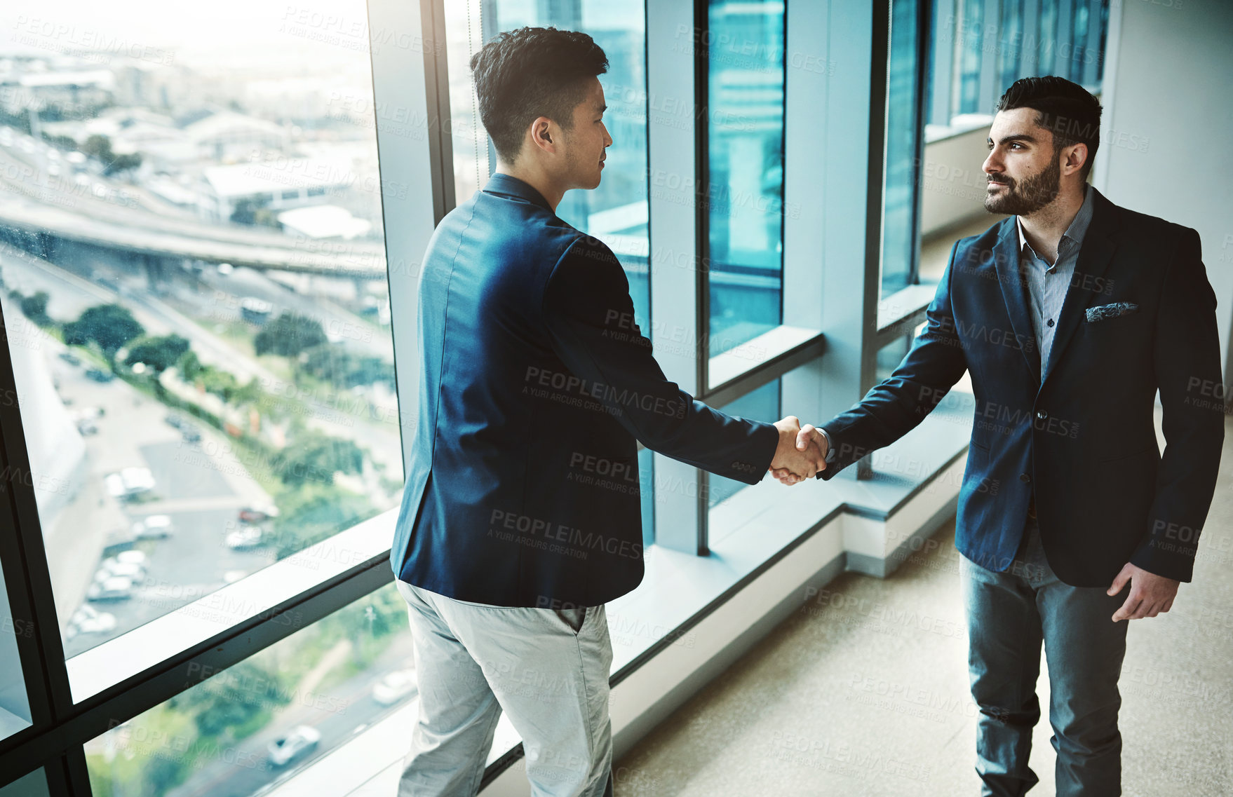 Buy stock photo Welcome, handshake or business people at airport for travel, meeting or hiring deal, success or immigration opportunity. Thank you, hello or men shaking hands for job interview, contract or b2b offer