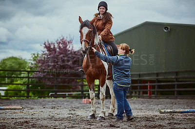 Buy stock photo Horse, child and trainer on farm for riding sport, countryside training and equestrian development. Stallion, girl and woman for balance support, practise advice and ranch hobby for exercise outdoor