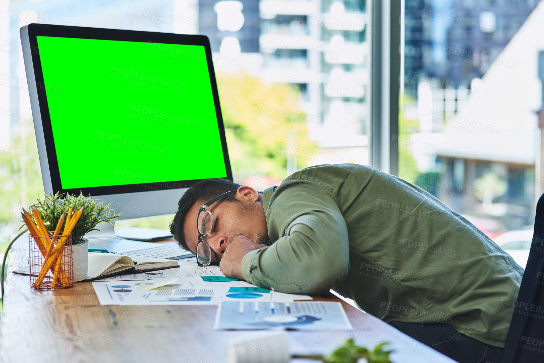 Buy stock photo Man, computer and green screen with sleeping in office with burnout, paperwork and graphs with mockup space. Person, tired and exhausted by pc with blank ux, chromakey or documents with charts at job