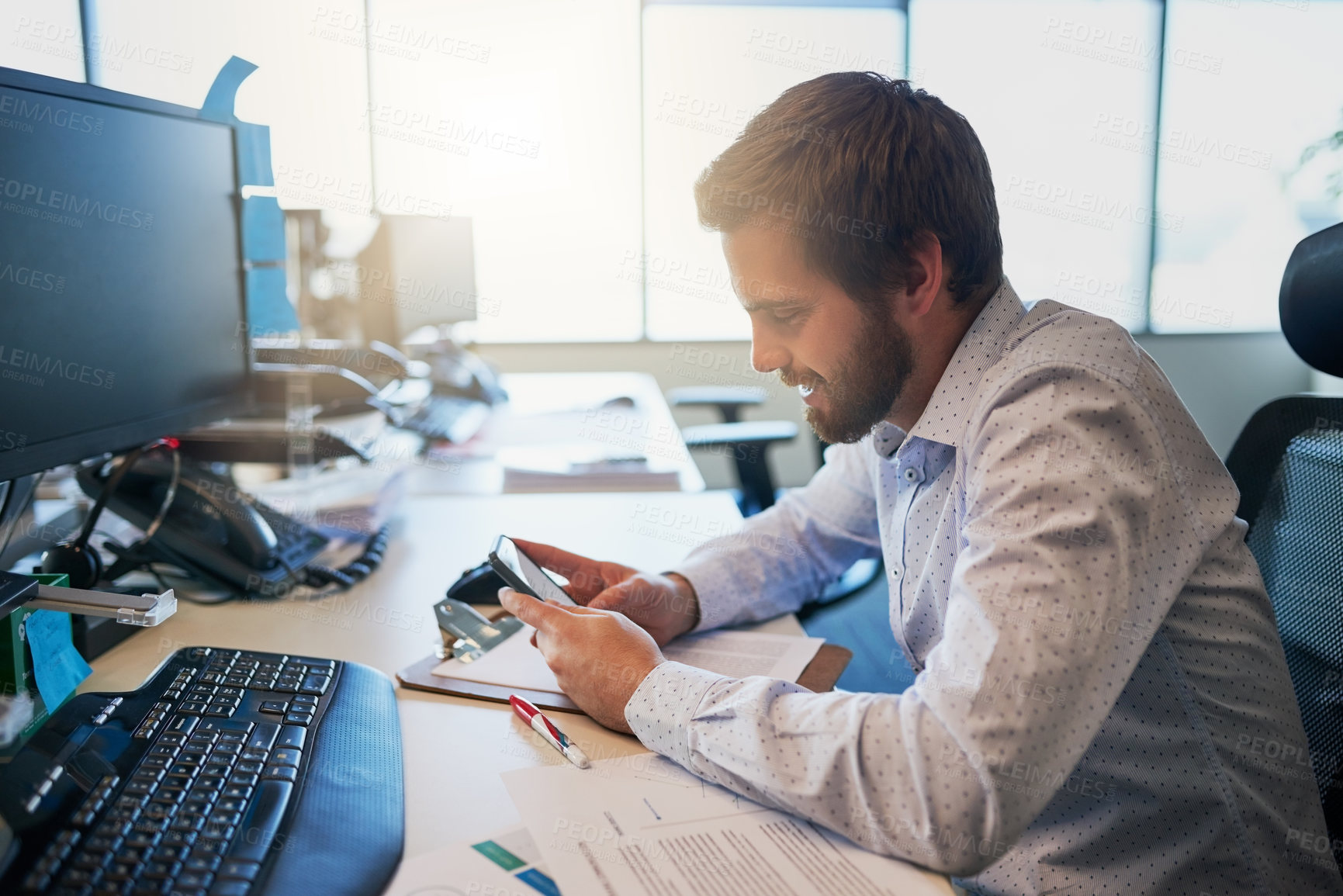 Buy stock photo Businessman, smile and phone for typing message, email notification and calendar app for planning schedule in office. Employee, mobile and internet scroll for social media, work break and reading sms