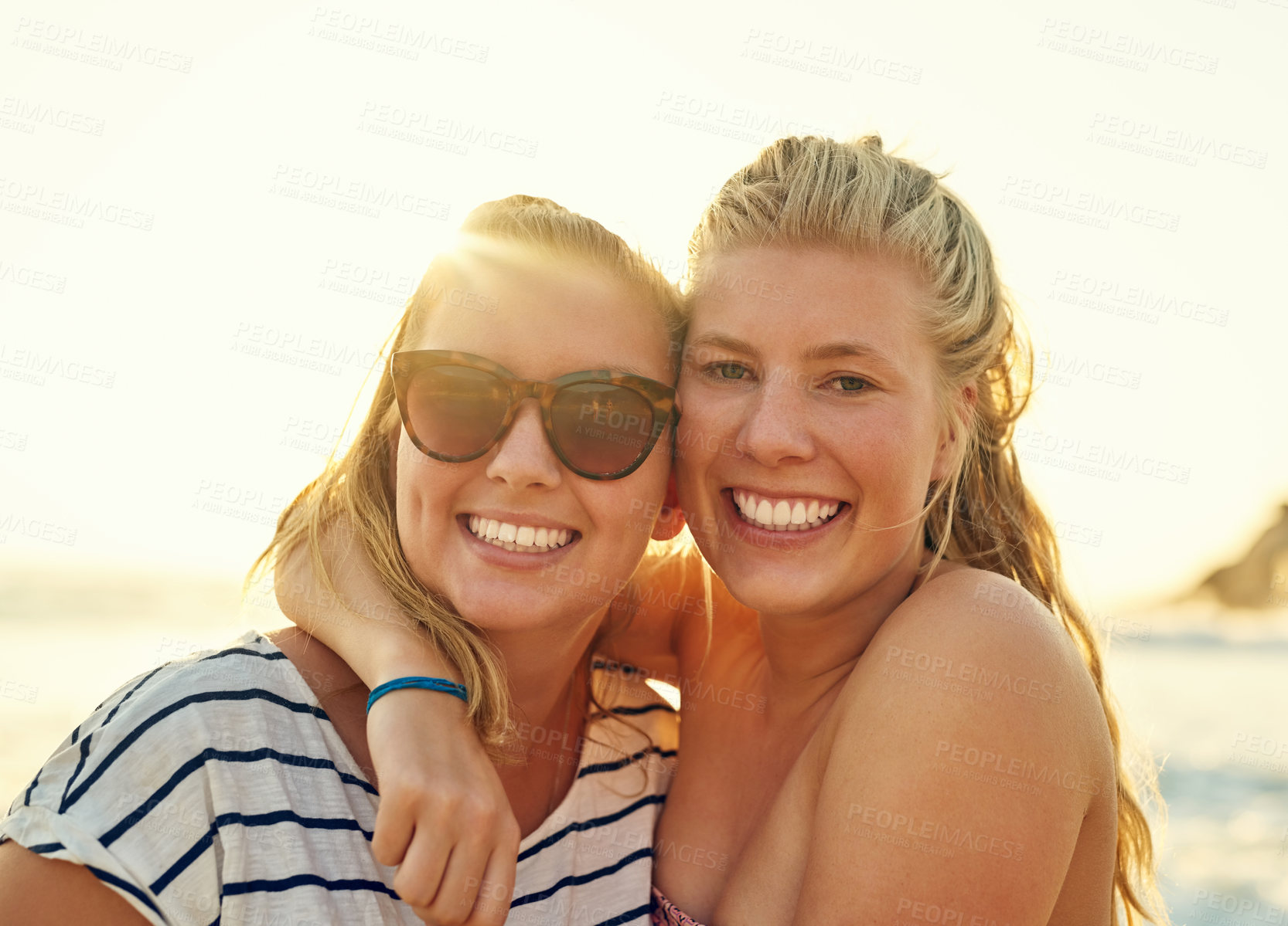 Buy stock photo Portrait, woman and friends with hug at beach for summer vacation, bonding and travel together in Miami. Smile, lgbtq couple and embrace in sunshine for sunglasses, date support and relationship care