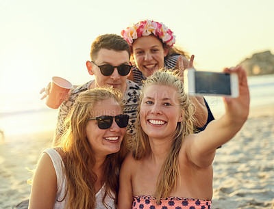 Buy stock photo Happy, group and friends with selfie at beach for summer photography, social media post and travel bonding. Smile, people and profile picture update, reunion memory and sunglasses for ocean vacation