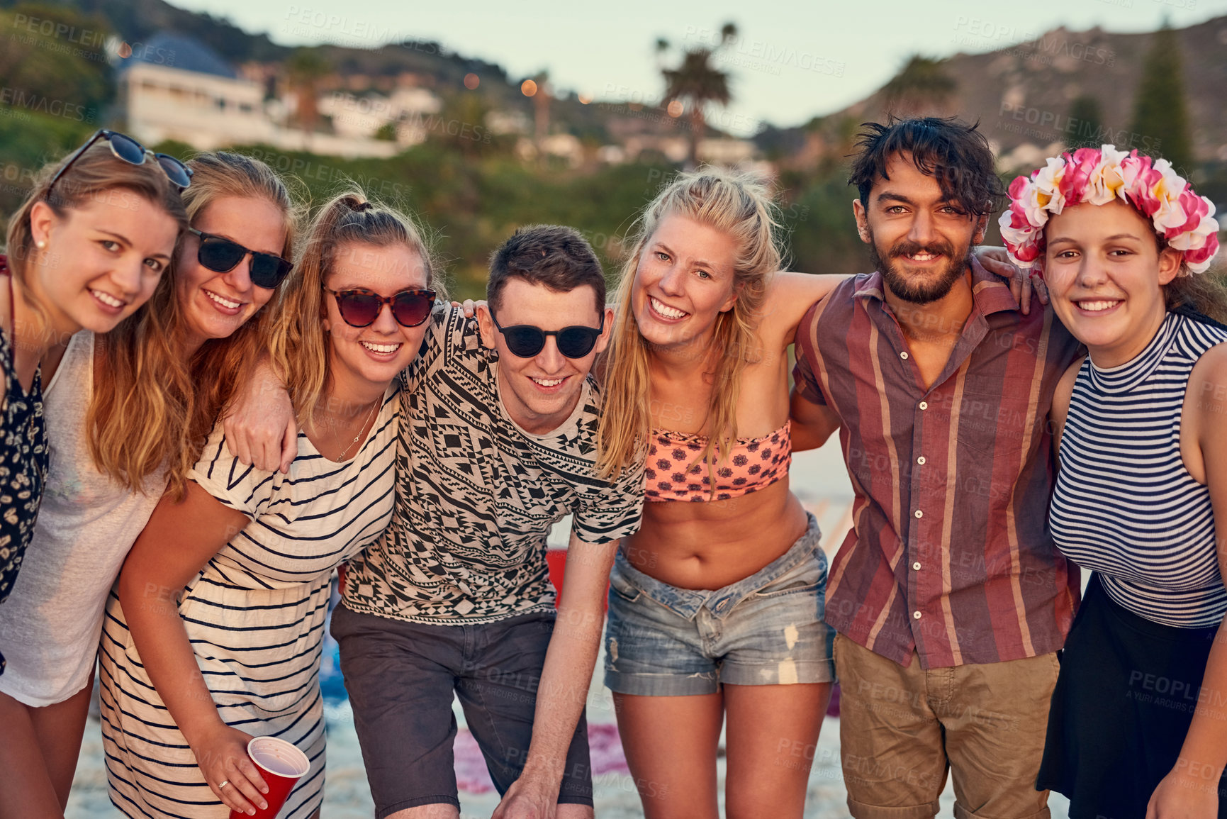 Buy stock photo Happy, group and friends with portrait at beach for summer vacation, bonding embrace and travel together in Miami. Smile, people and reunion party with sunshine, sunglasses and celebrate on island