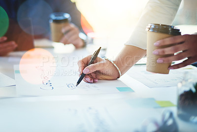 Buy stock photo Cropped shot of unrecognizable businesspeople working together in an office