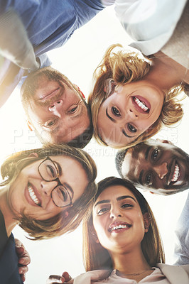 Buy stock photo Cropped shot of coworkers looking down at the camera