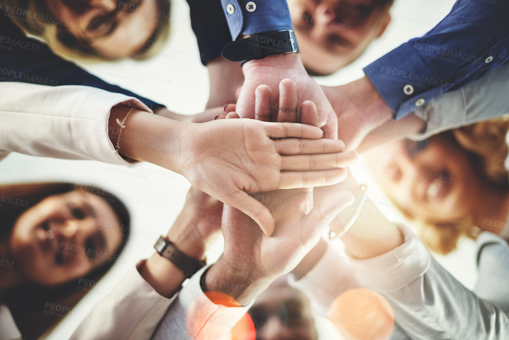 Buy stock photo Team, hands of colleagues together and smile with huddle for collaboration for goal with lens flare. Teamwork or cooperation, businesspeople or coworkers and happy people with hand for support 