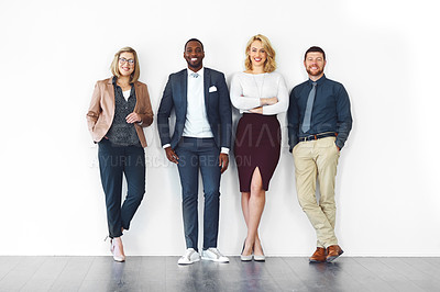 Buy stock photo Teamwork, about us and smile with portrait of business people in studio for partnership, diversity and community. Support, solidarity and pride with group of employee on white background for mission