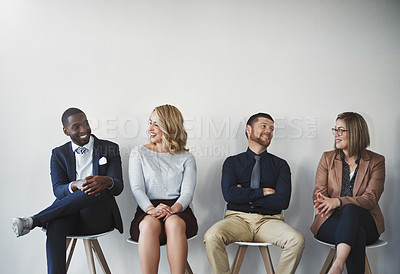 Buy stock photo Studio shot of businesspeople waiting in line against a white background