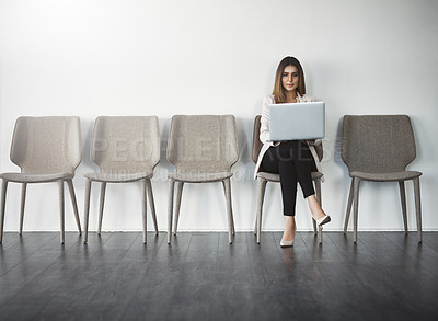 Buy stock photo Recruitment, laptop and woman in waiting room for interview, job application or hiring on chair. Human resources, typing and person with technology in office for opportunity, onboarding or employment