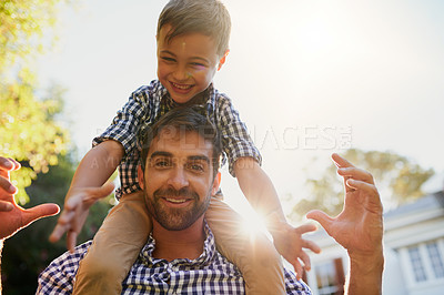 Buy stock photo Shot of a father and son spending the day together outside
