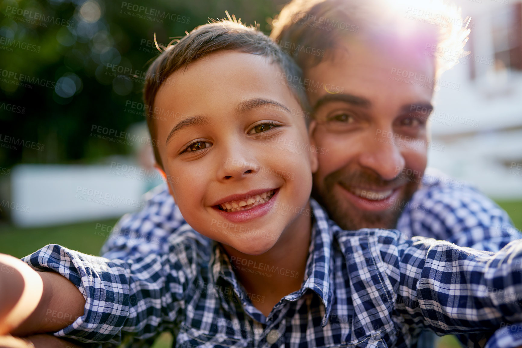 Buy stock photo Selfie, father and son with portrait outdoor in garden of home for profile picture update or happy memory. Photography, dad and child with smile in backyard of house for bonding and social media post