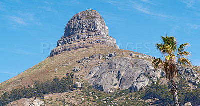 Buy stock photo Landscape view, blue sky with copy space of Lions Head in Cape Town, South Africa. Steep, rough, scenic famous hiking, trekking terrain with trees growing around it. Travel abroad, tourism overseas