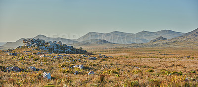 Buy stock photo Mountains, grass and space with field in park for landscape, environment or flowers. Bush, summer and wilderness with reserve in Cape Town ecology for floral habitat, sustainability and nature mockup