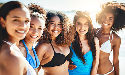 Buy stock photo Portrait of a group of happy young women having fun together at the beach