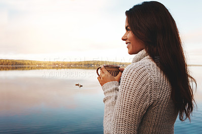 Buy stock photo Outdoor, smile and woman with coffee in river, sunrise and happy in nature for vacation and morning. Break, writer and girl thinking of inspiration in countryside of Finland with peace and lake